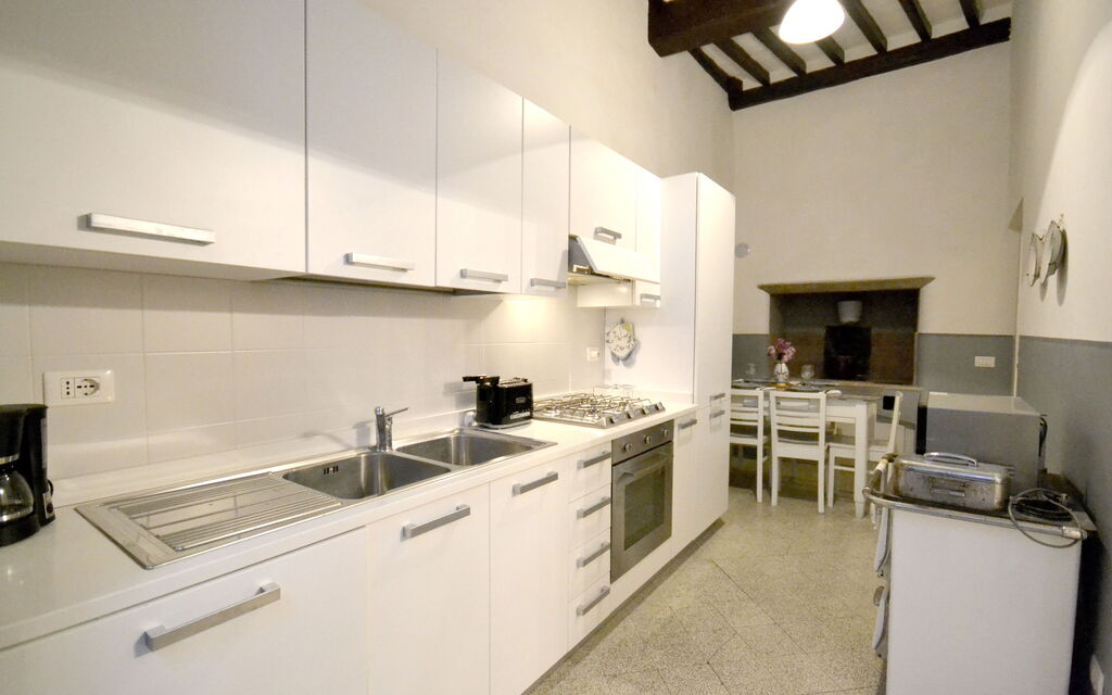 Appartamento La Piazzetta: Dining room and kitchen