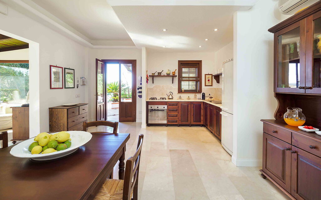 Sicilia 003 - Cala Mancina: Dining room and kitchen