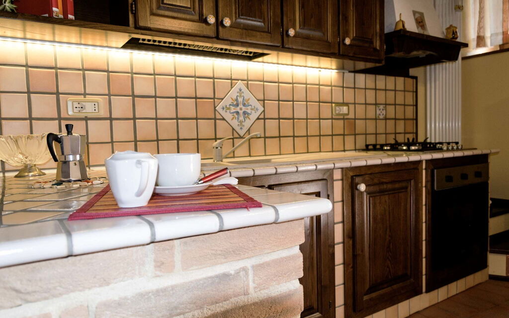 Appartamento Le Ceramiche: Kitchen